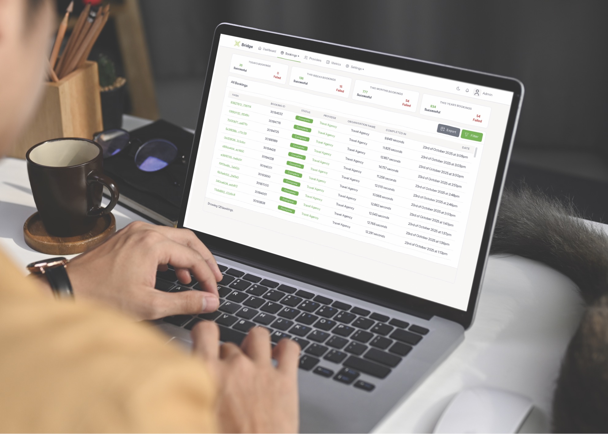 Bridge dashboard - User holding laptop