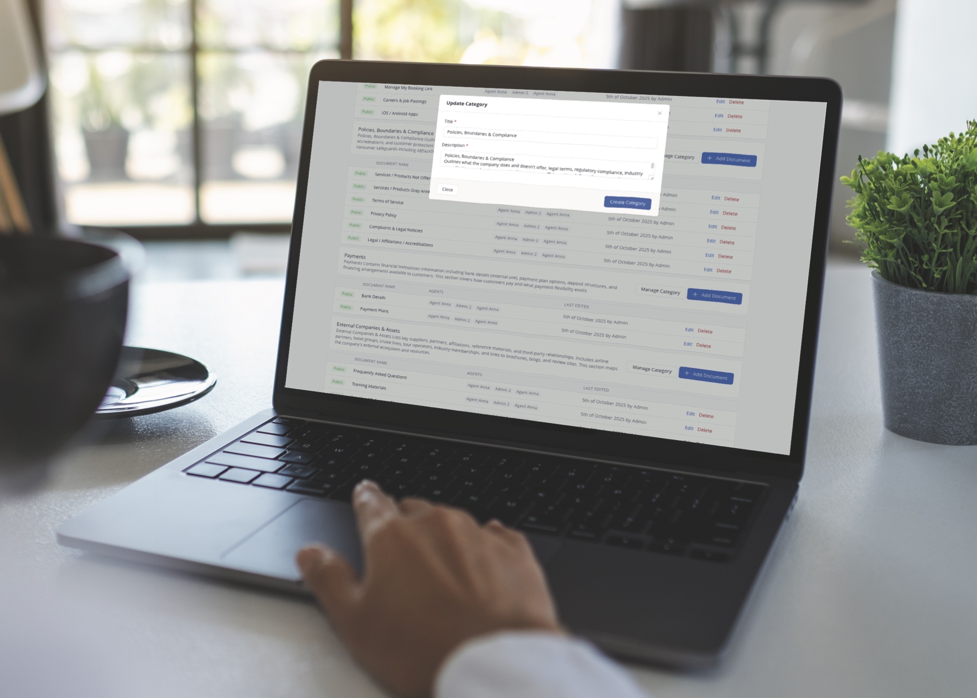 Knowledge dashboard editing content displayed on a laptop